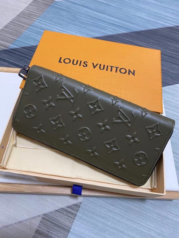 Louis Vuitton Monogram Seal Cowhide Leather Slender Wallet M80520 4