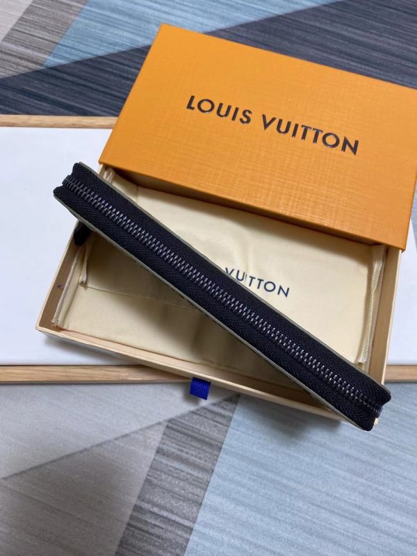 Louis Vuitton Monogram Seal Cowhide Leather Slender Wallet M80520 3